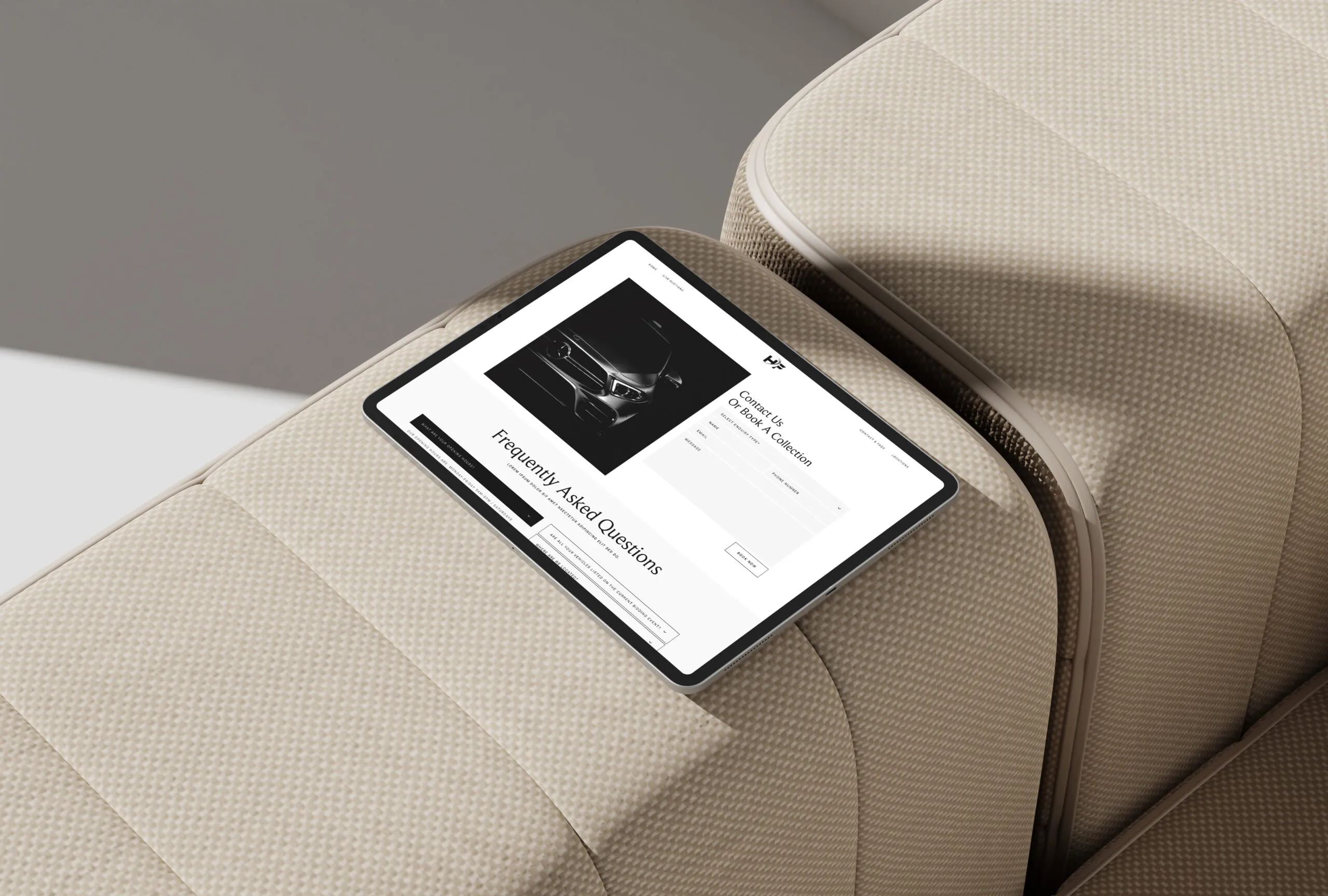 tablet showing a screenshot of a contact form in a luxury auctions website