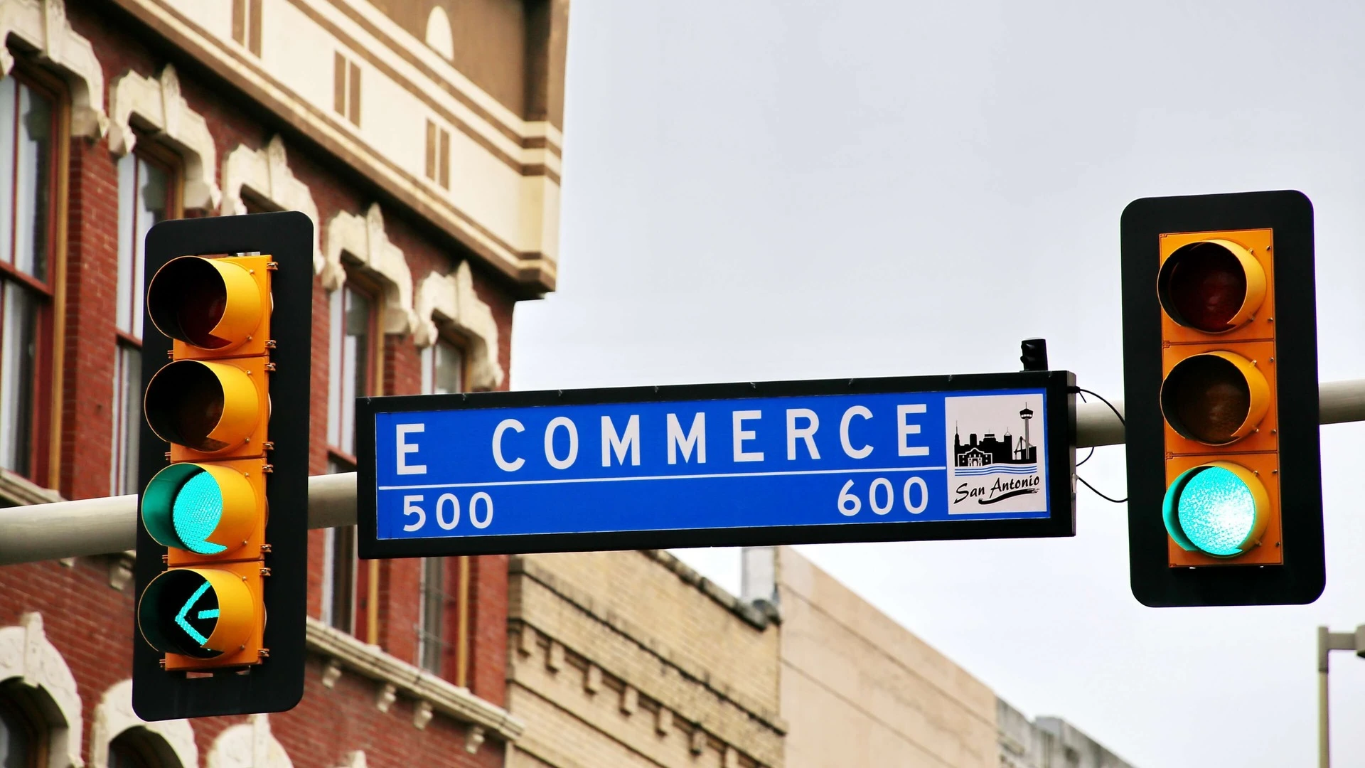 a picture of a green light and a sign saying e-commerce